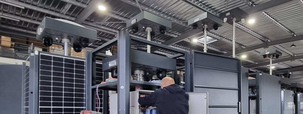 OMNIGARD detection heads lined up in a workshop during batch production